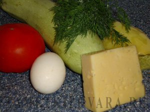 Кабачки, фаршированные овощами и сыром